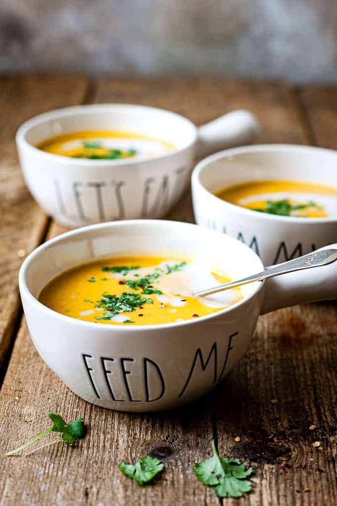 This homemade butternut squash soup is the best you'll ever taste! This recipe is super creamy and so thick with a hint of spiciness. So healthy and full of delicious butternut flavour. It's healthy, vegan, and all the ingredients are from Aldi UK. The leftover soup tastes even better the next day. And also, It's perfect for freezing! An absolute "must make" recipe for all autumn and winter long. #soup #aldiuk #freezerfriendly #savvybites
