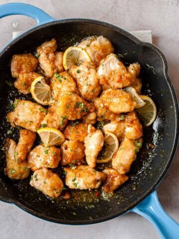 Crispy Chinese lemon chicken in a skillet. Made using only Aldi ingredients.