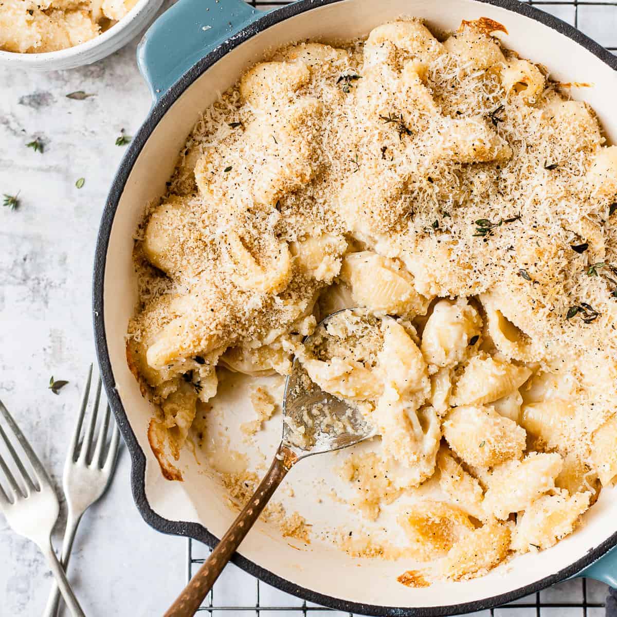 Baked mac and cheese with a spoon.