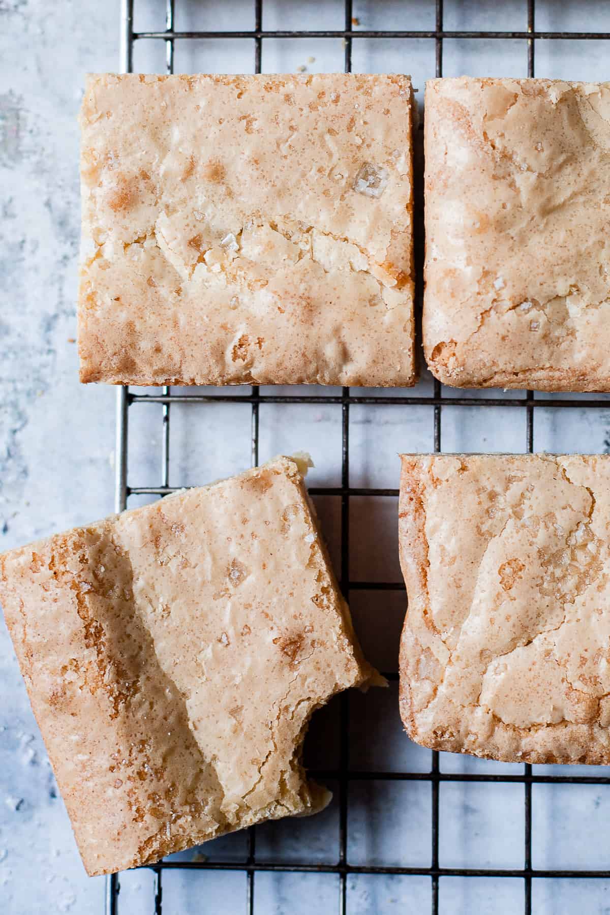 white chocolate blondies on a cooling rack