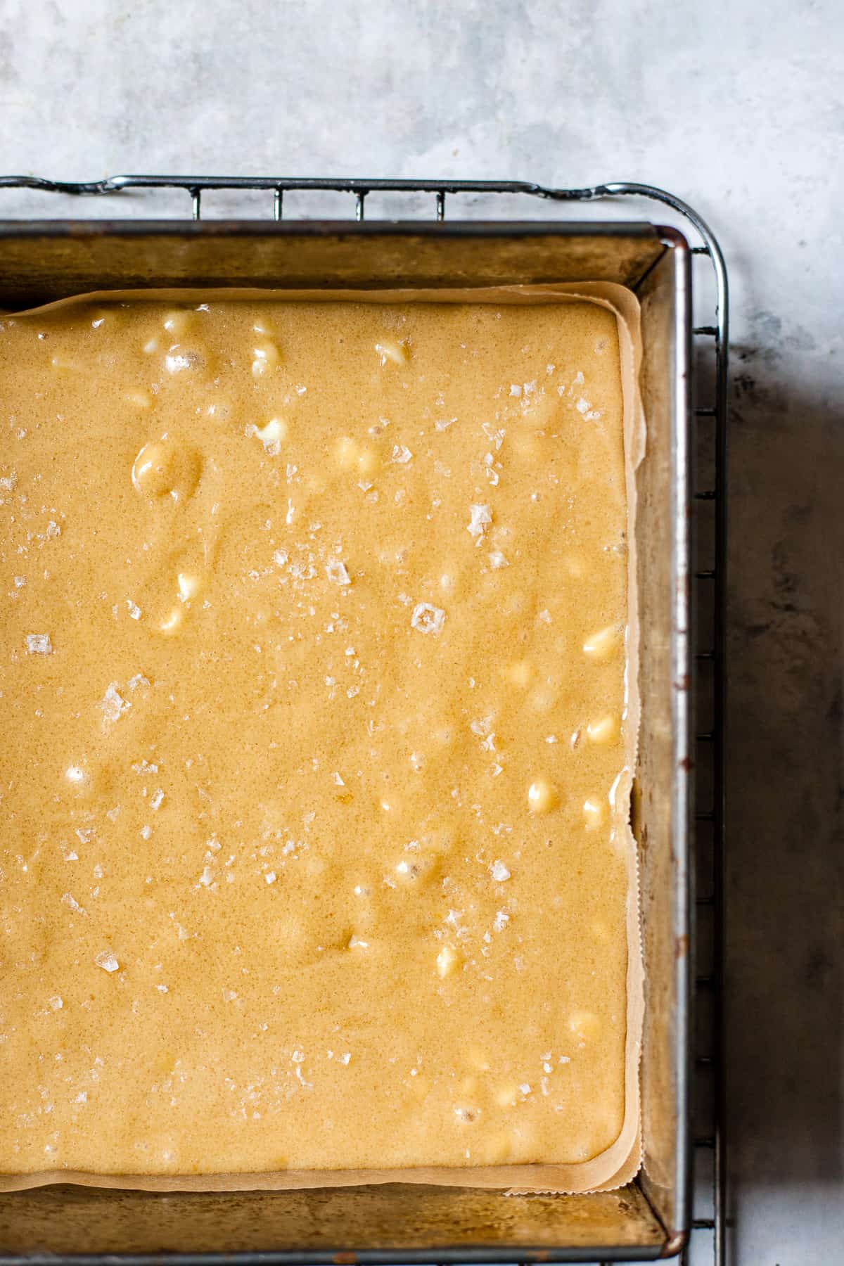 blondies in a tray before baking