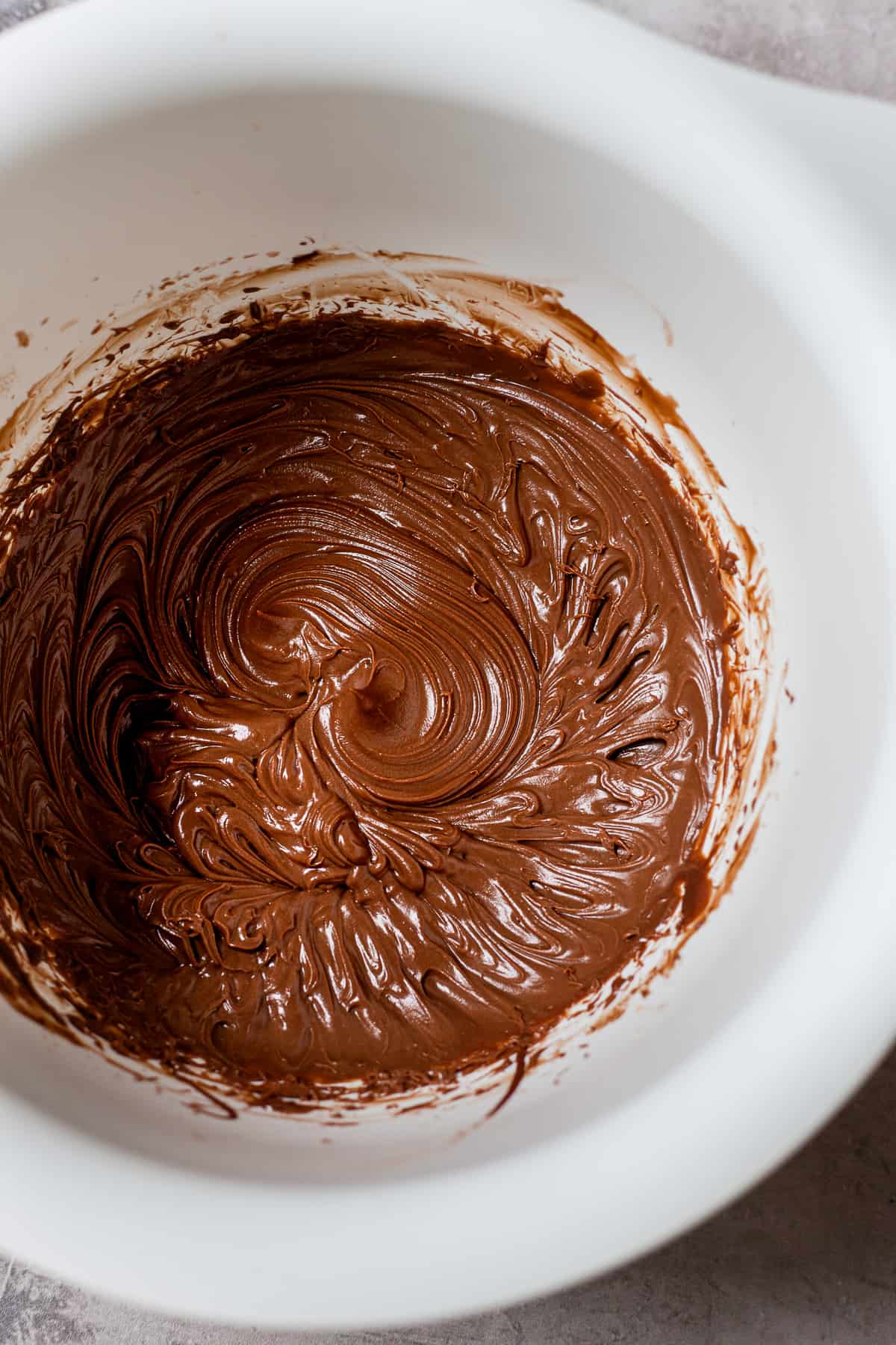 Whipped chocolate mousse in a mixing bowl.