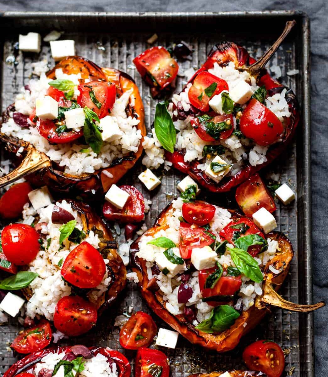 Stuffed peppers with rice on a baking tray. Aldi recipe