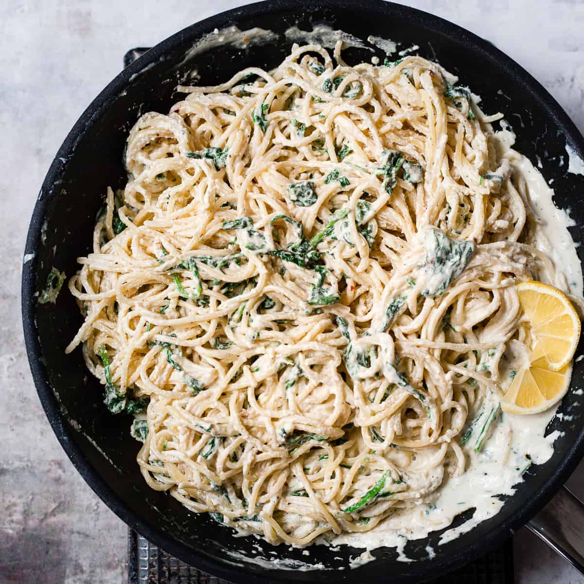 spinach ricotta pasta in a skillet
