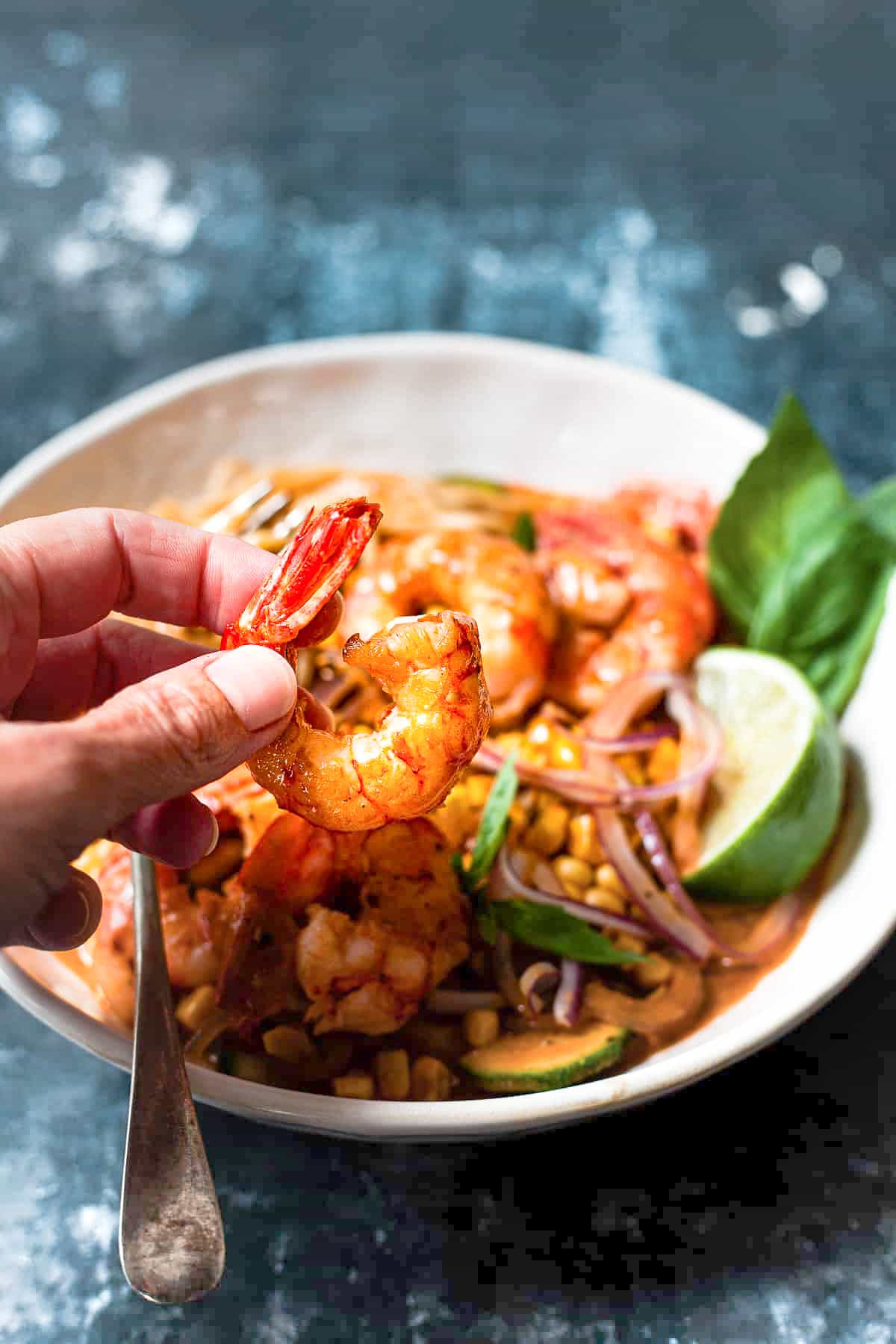 Close up of Prawn red curry in a bowl.