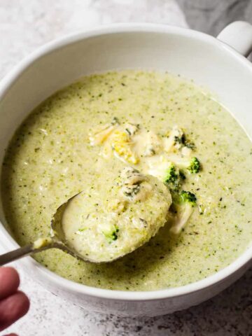 broccoli and stilton soup with a spoon.