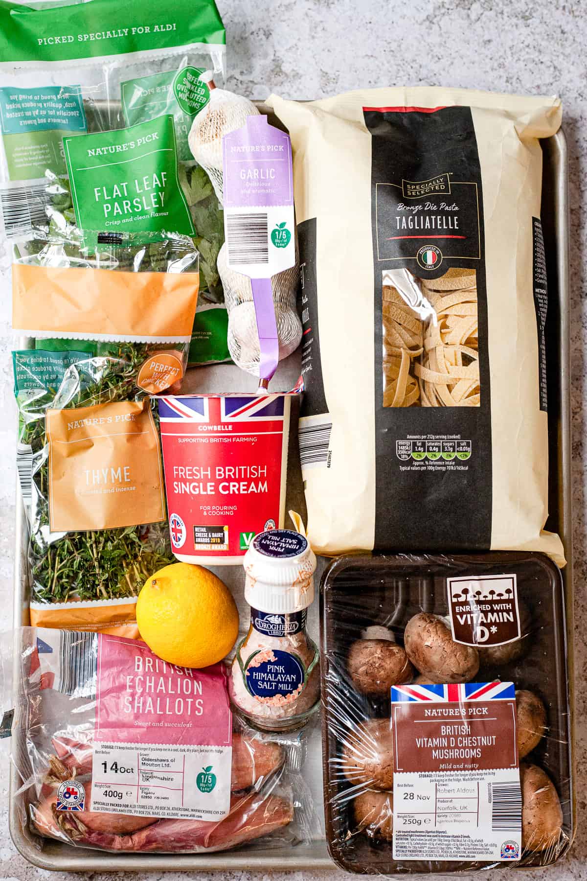 Aldi ingredients for mushroom tagliatelle on a silver tray.