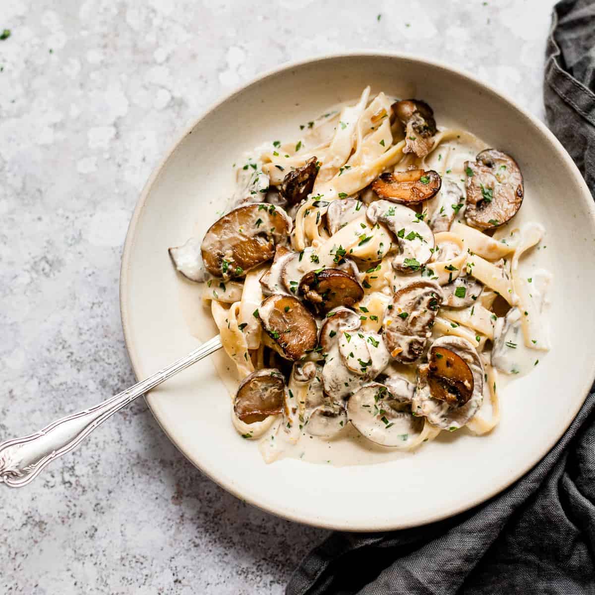 Mushroom pasta with herbs and parmesan.