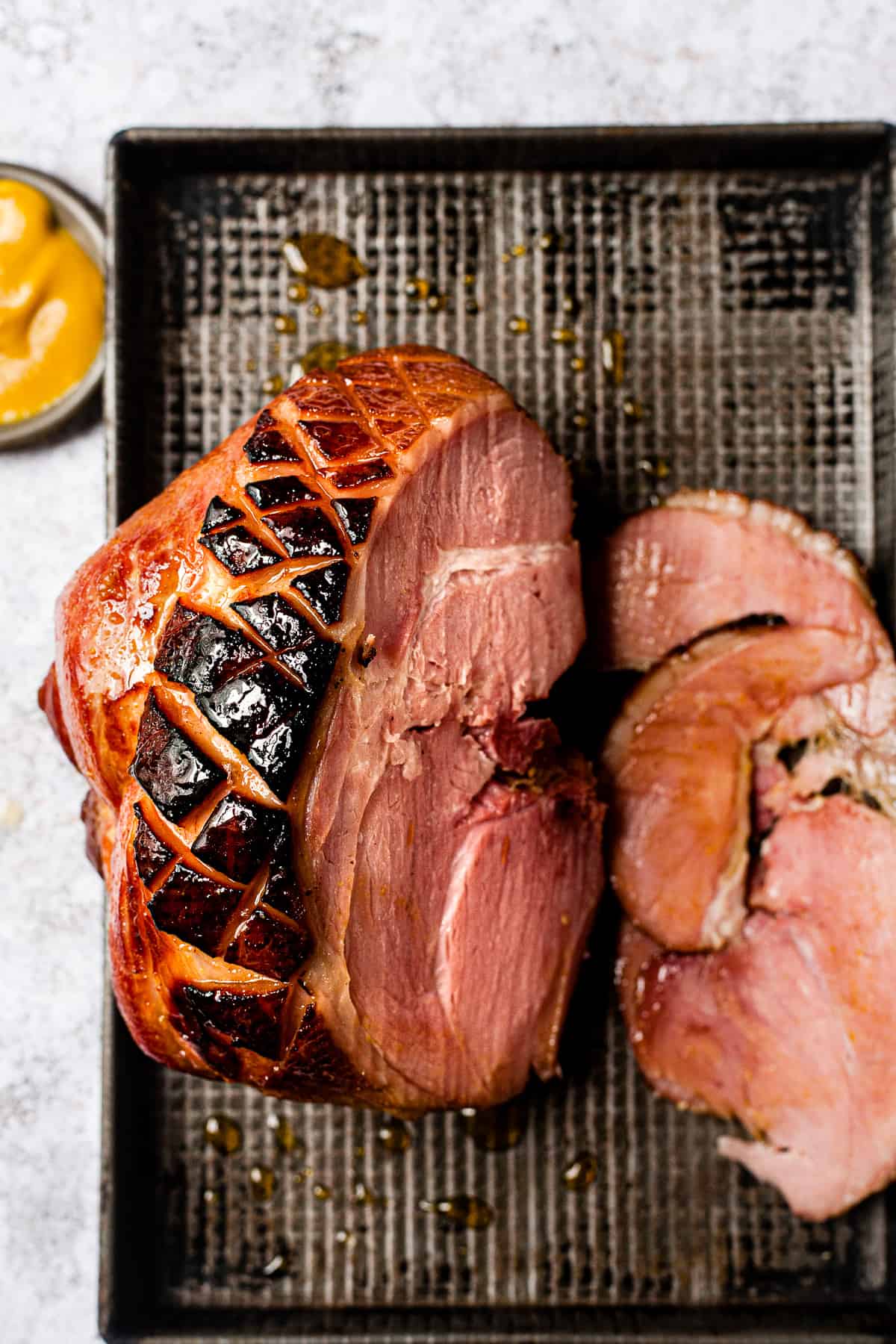 A gammon joint fresh from the slow cooker and glazed with honey.