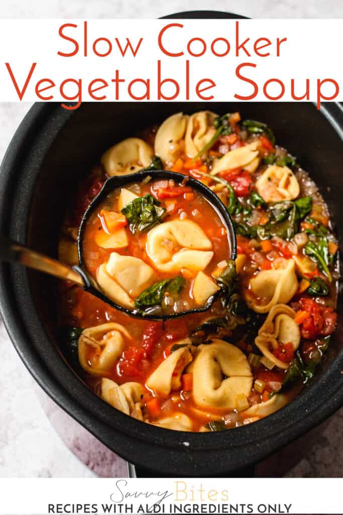 Vegetable Soup in a ladle with tortellini with text overlay.