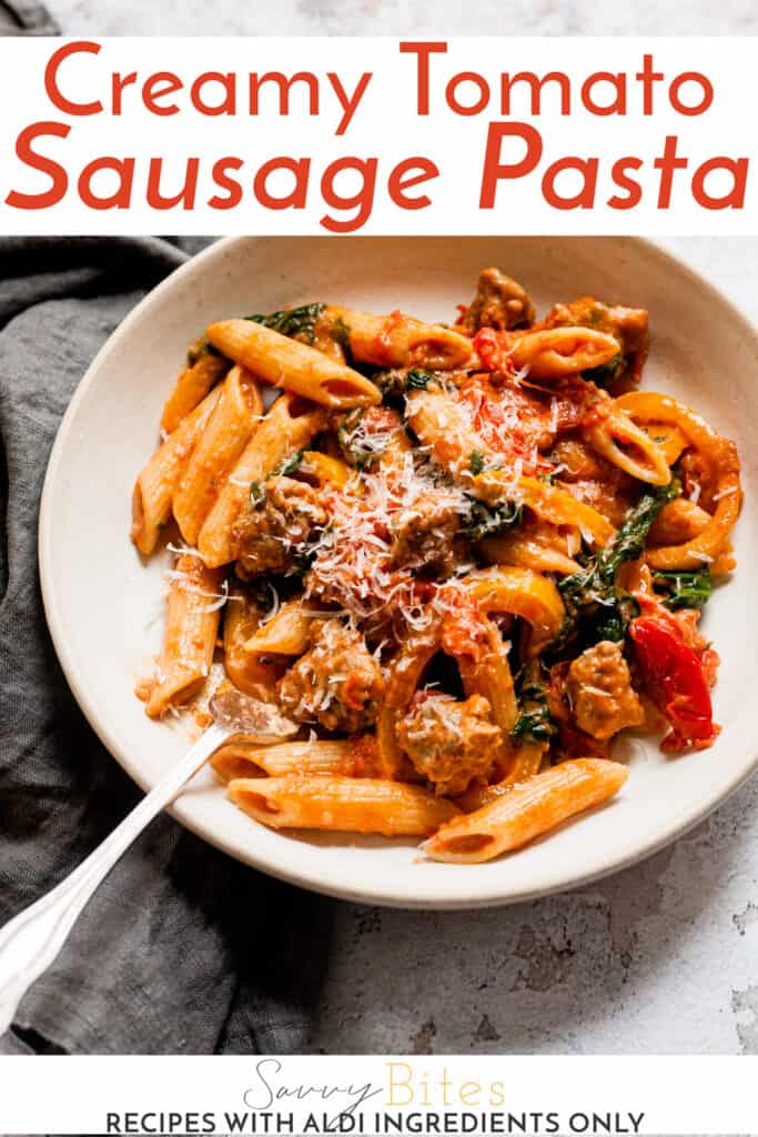 Sausage pasta in a pan with text overlay.