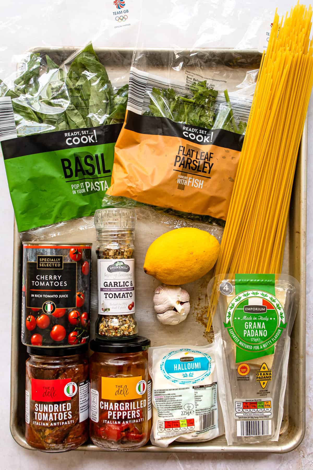 ingredients for 30 minute halloumi pasta on a tray. Aldi recipe