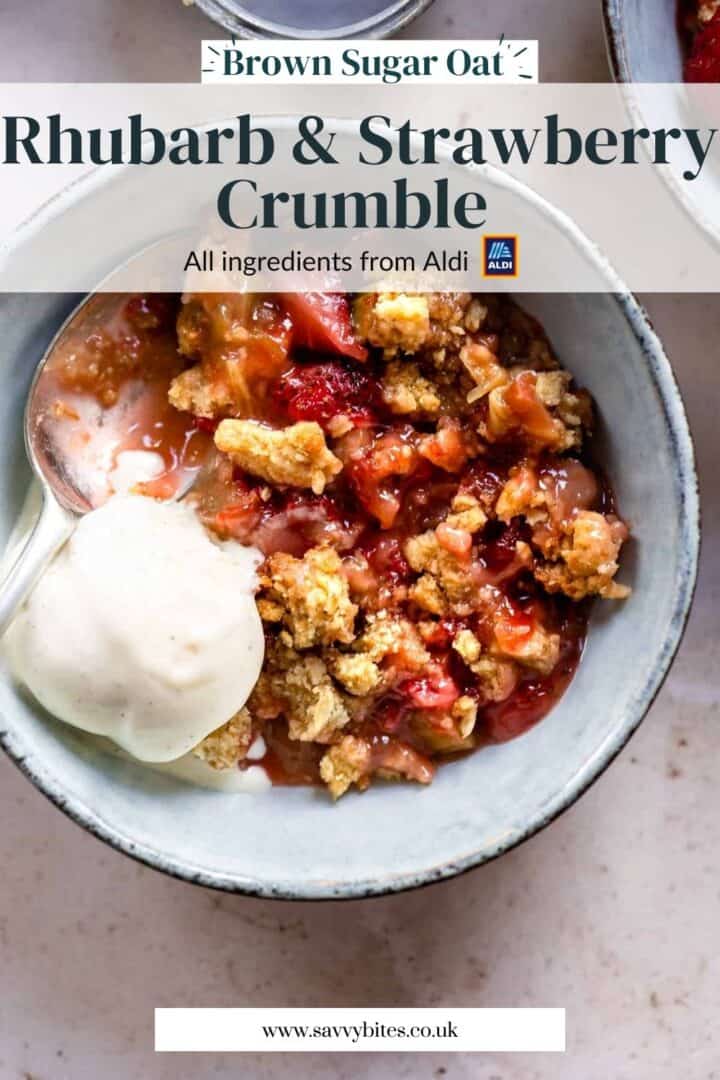 Rhubarb and strawberry crumble with ice cream in a bowl.