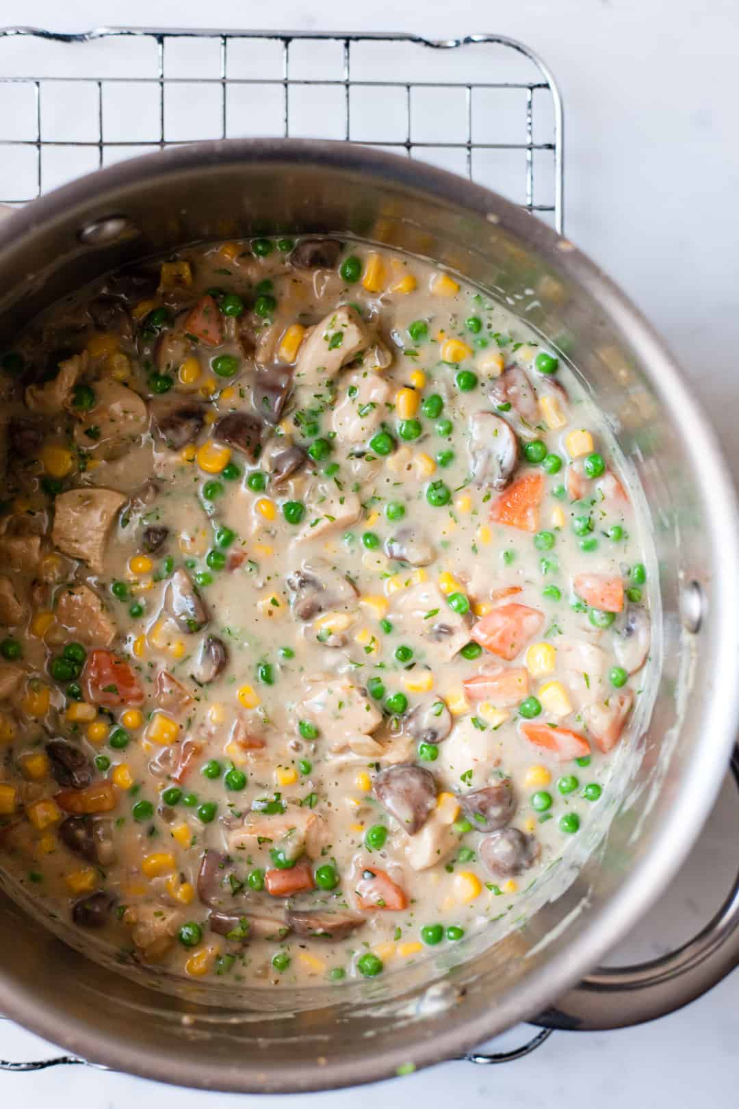 Chicken pie filling with vegetables.
