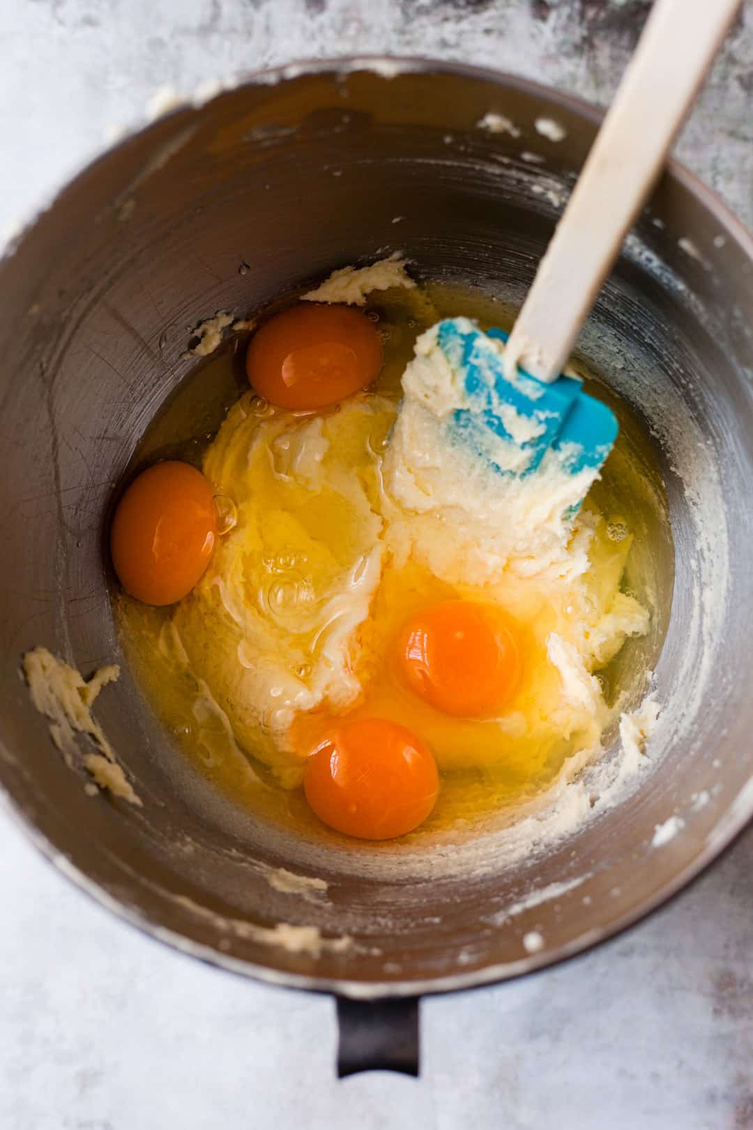Eggs are whisked into the cake batter.