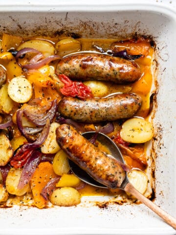 Sausage traybake with potatoes and vegetables.