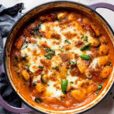 One pot chorizo gnocchi bake in a pan with mozzarella.