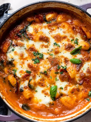 One pot chorizo gnocchi bake in a pan with mozzarella.