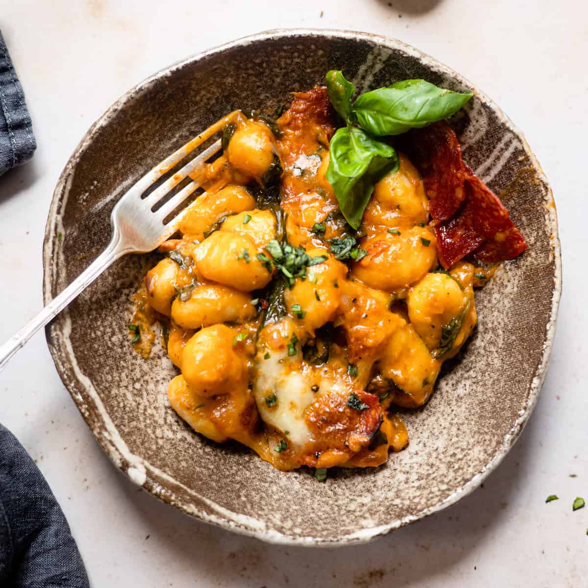 Aldi gnocchi with tomato sauce in a bowl with a fork