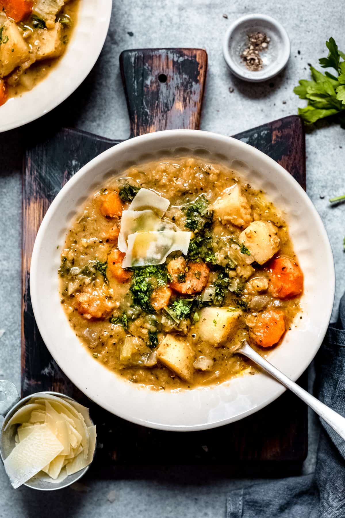 Easy slow cooker lentil soup in a white bowl