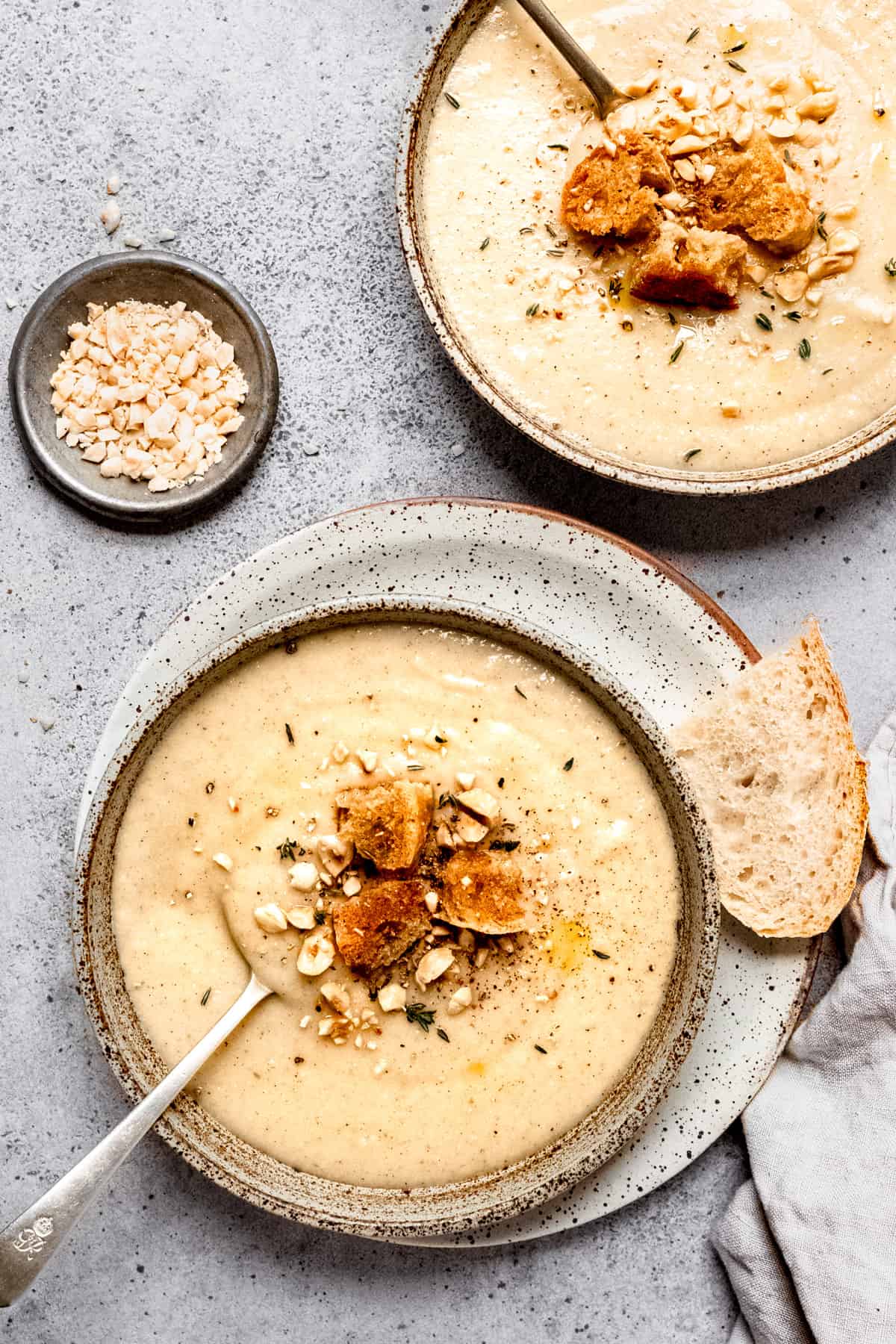 parsnip soup in a bowl with croutons