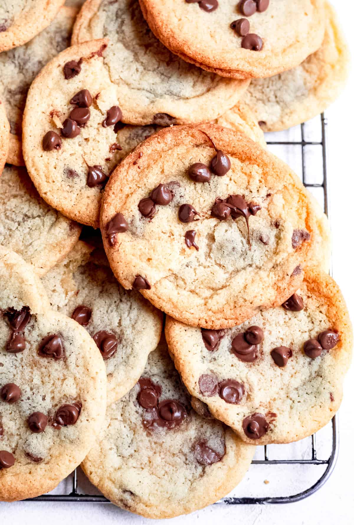 chocolate chip cookies without brown sugar on a cooling rack.