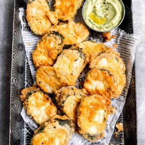 Fried courgette with avocado sauce.