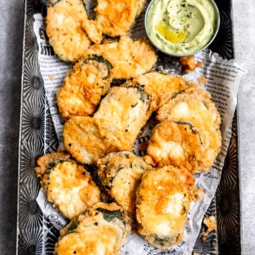 Fried courgette with avocado sauce.