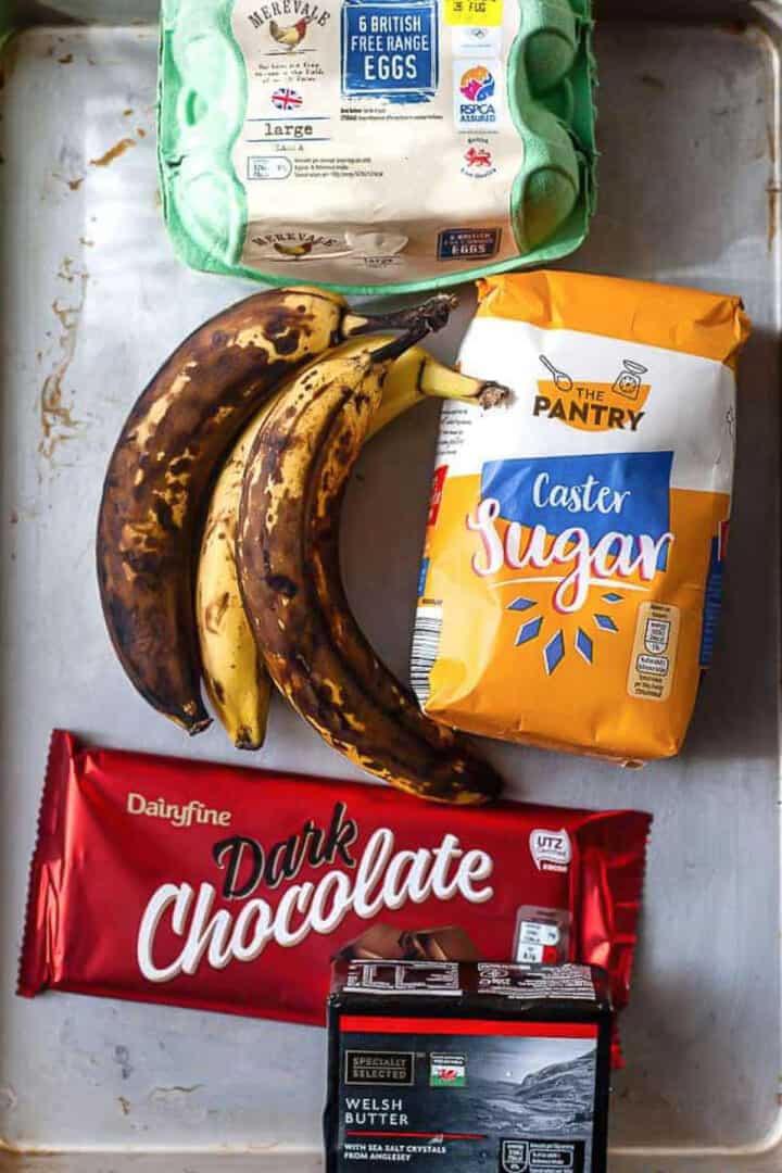ingredients for chocolate banana bread on a baking tray
