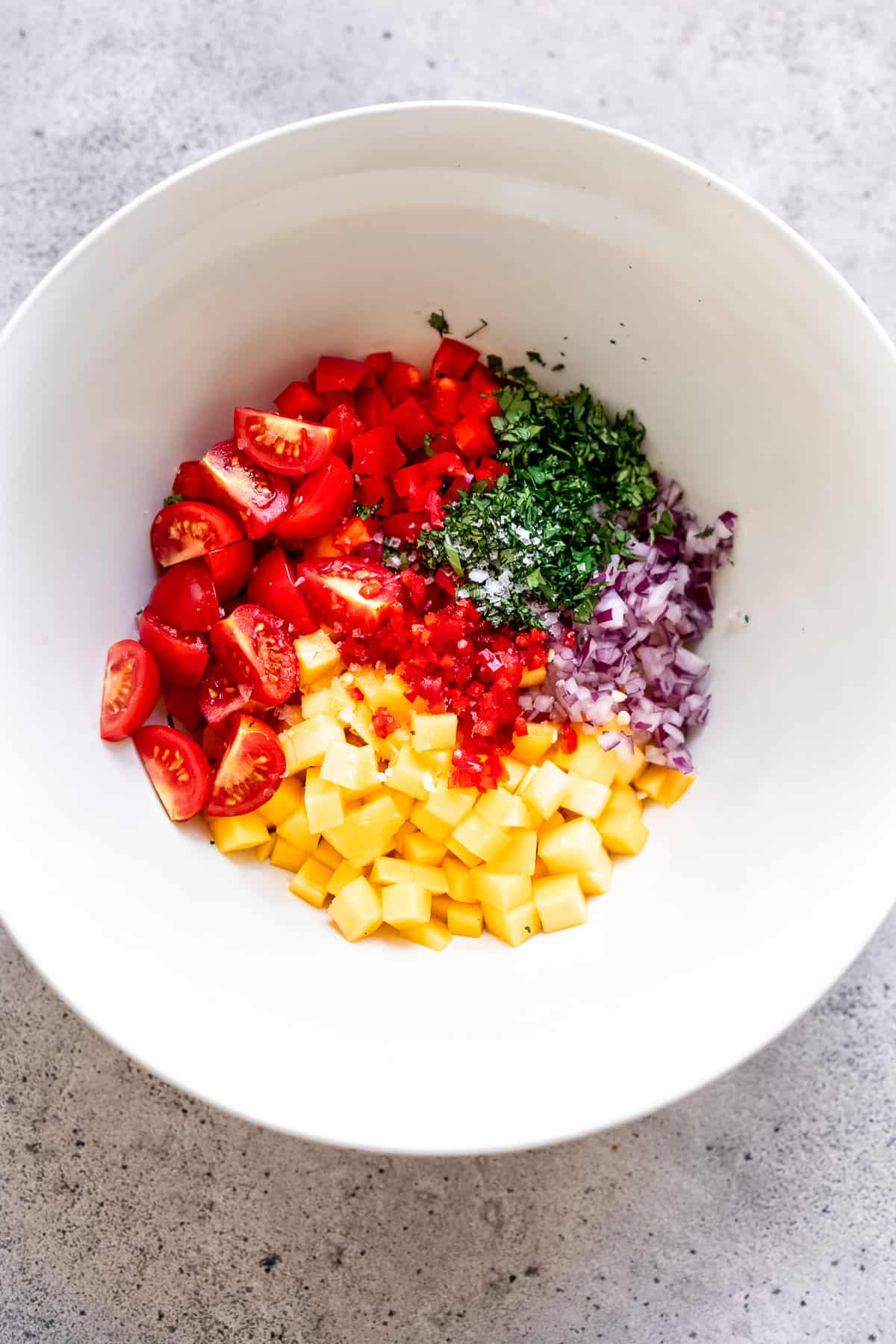 Mango salsa ingredients in a bowl.