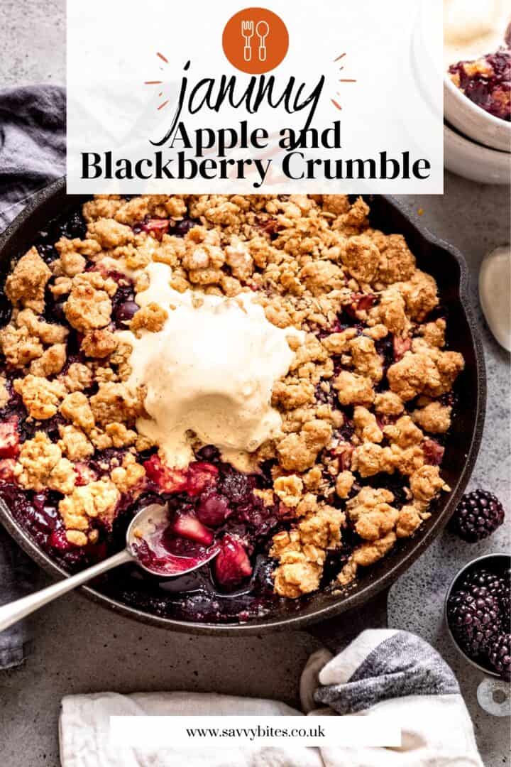 Baked fruit crumble with oat topping in a skillet.