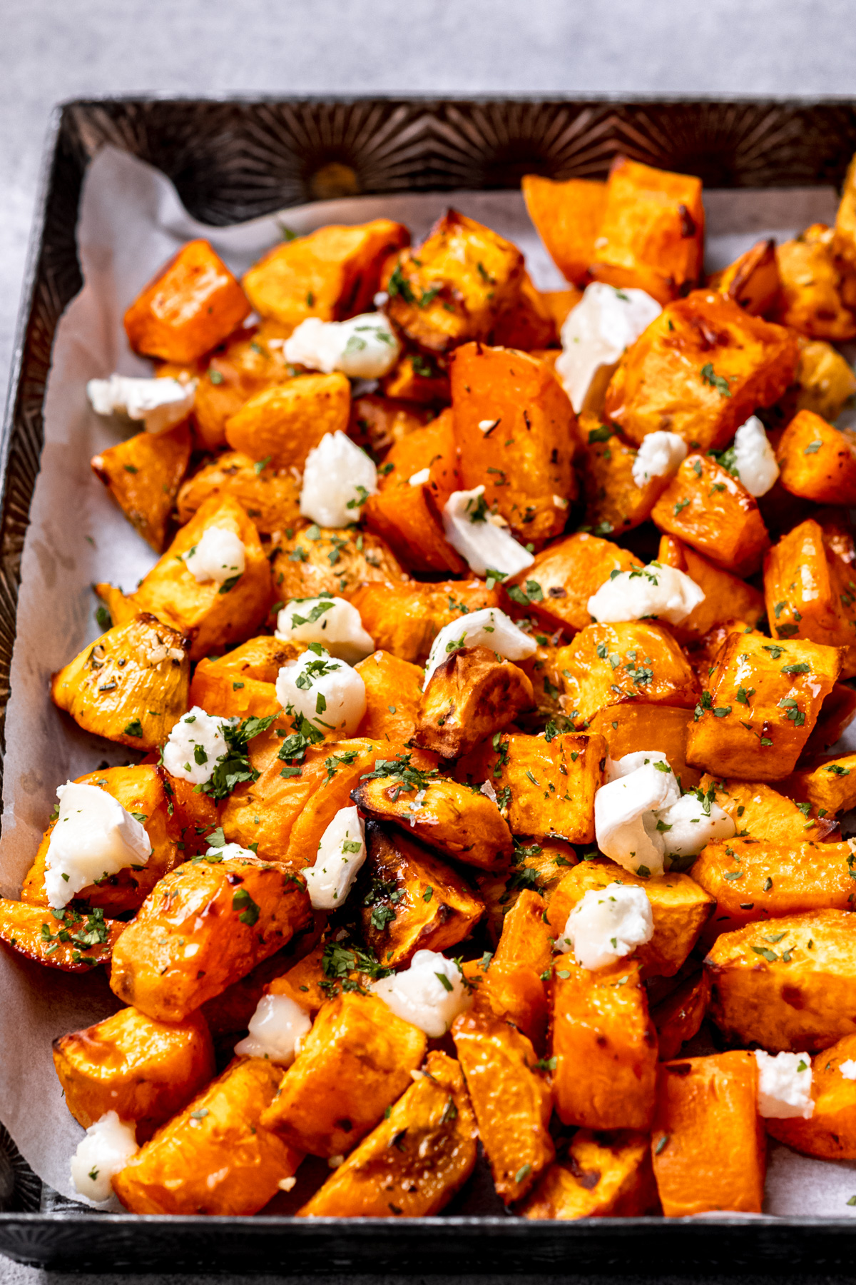 Sweet potatoes with goat's cheese and parsley.