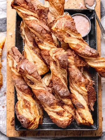 Flaky puff pastry twists with cinnamon.