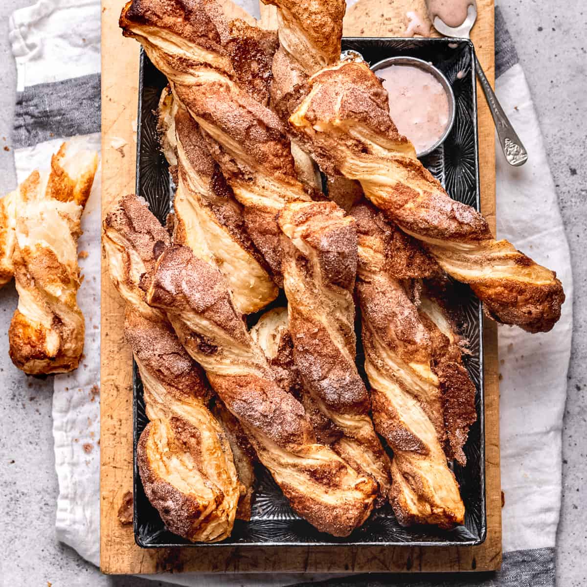 Flaky puff pastry twists with cinnamon.