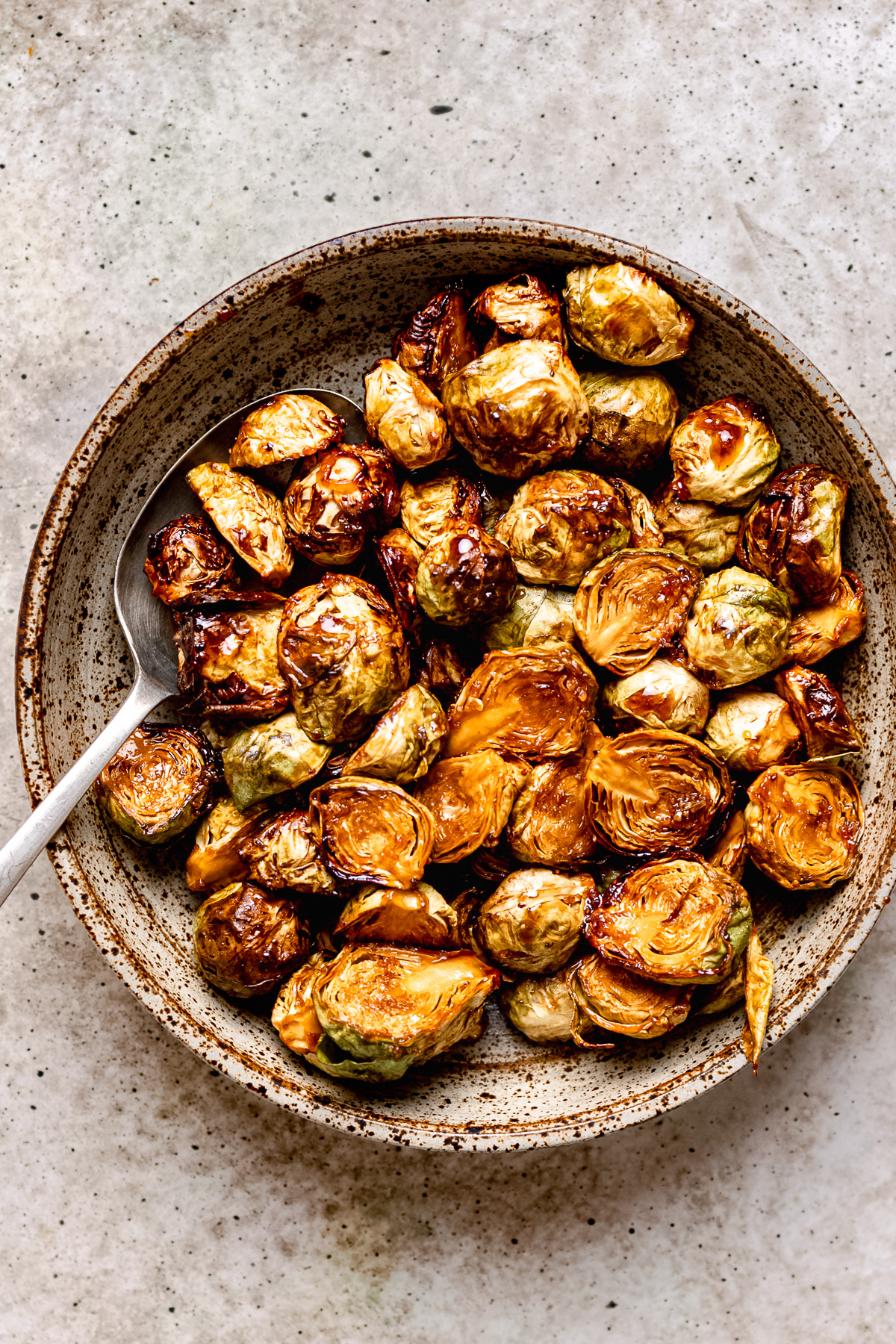 Crispy air fryer Brussels sprouts with balsamic glaze.