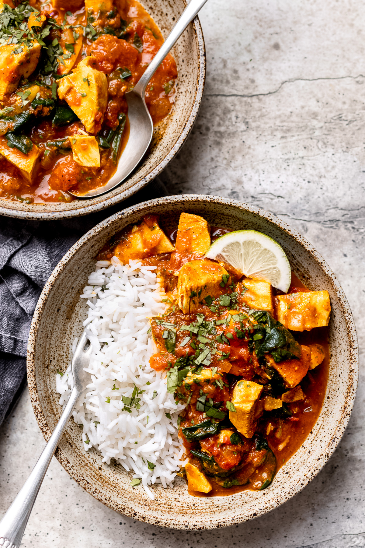 Leftover turkey curry in a green bowl.