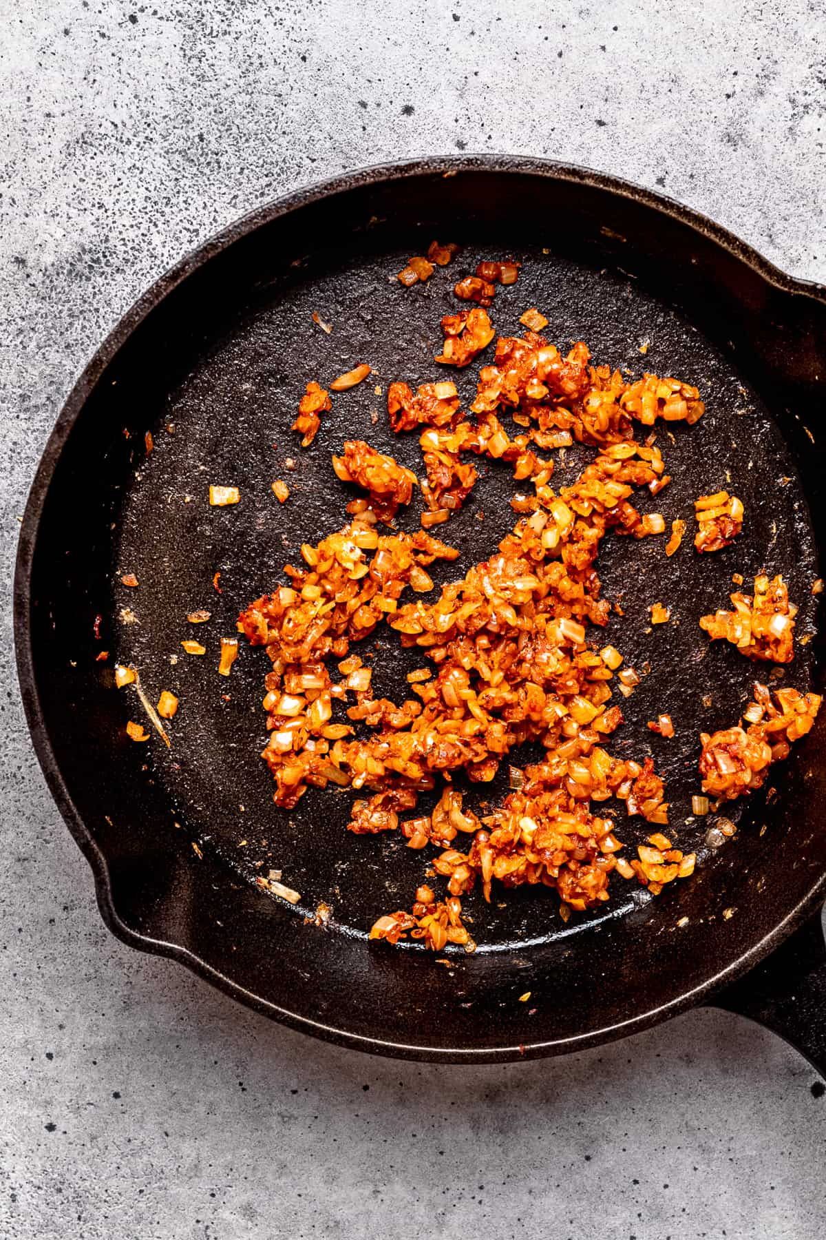 Sauteed onions with tomato paste.