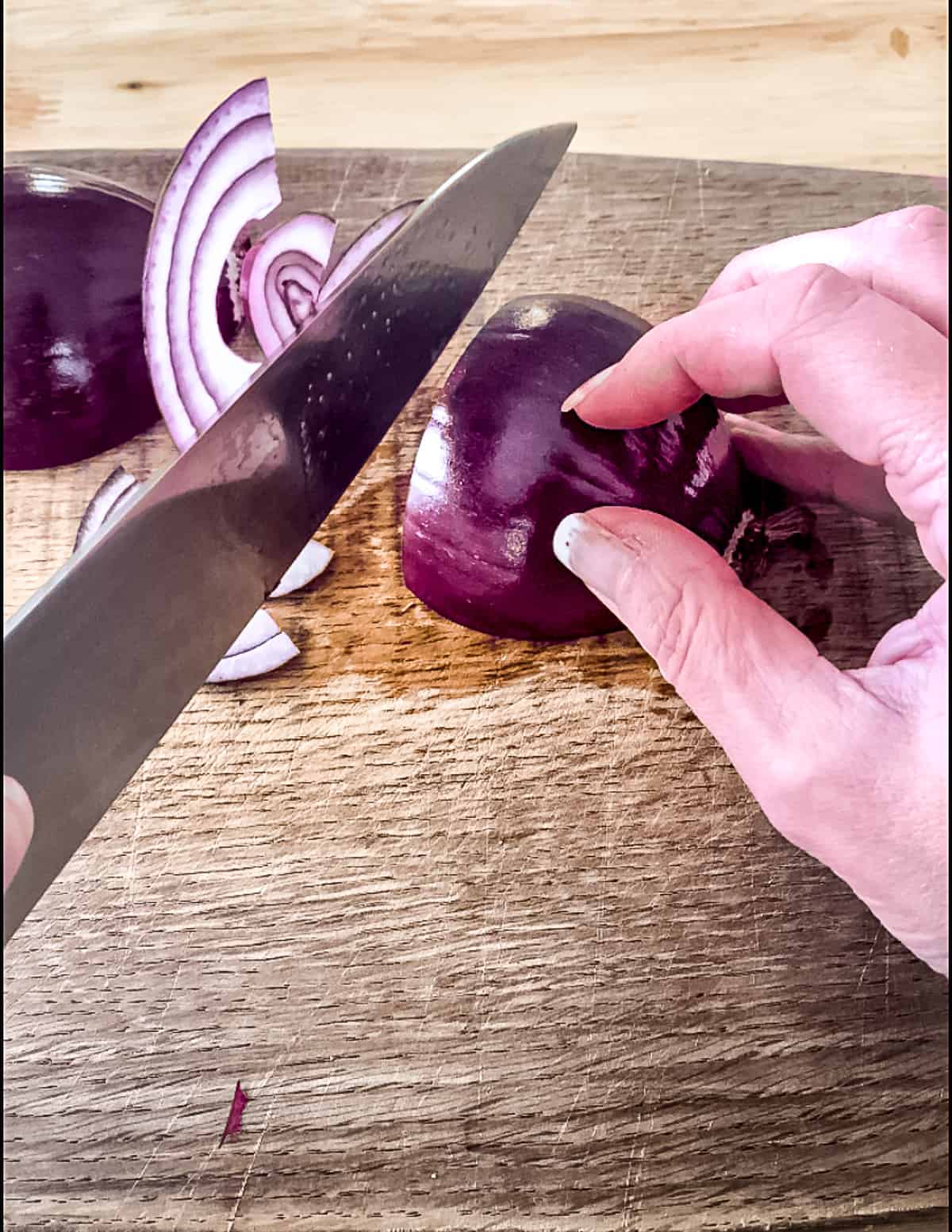 Onion being finely sliced.