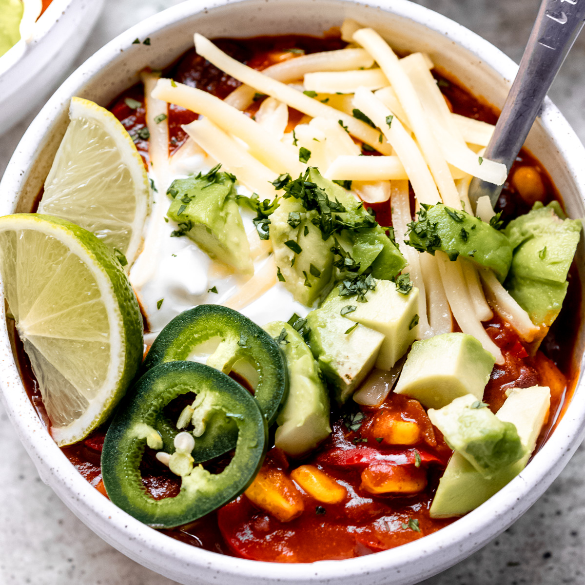 Smoky 5 bean chilli in a white bowl.