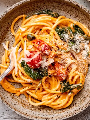 Creamy mascarpone tomato pasta in a bowl.