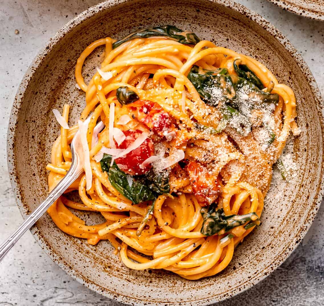 Creamy mascarpone tomato pasta in a bowl.