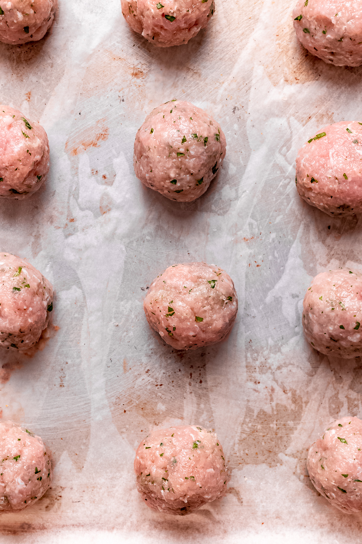 Turkey meatballs on a baking tray.