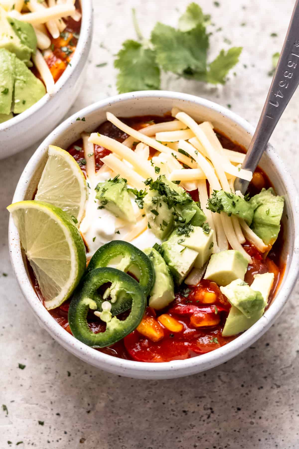 Chilli in a bowl with cheese.