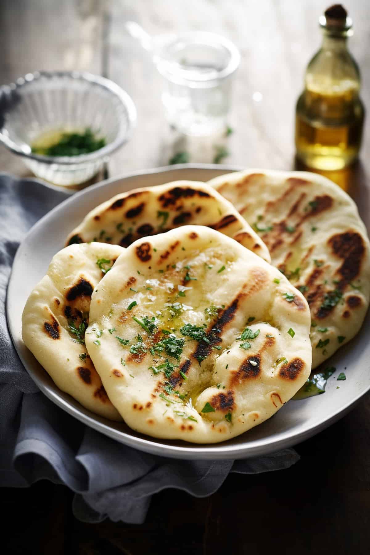 Easy 2 ingredient naan bread with herb butter.
