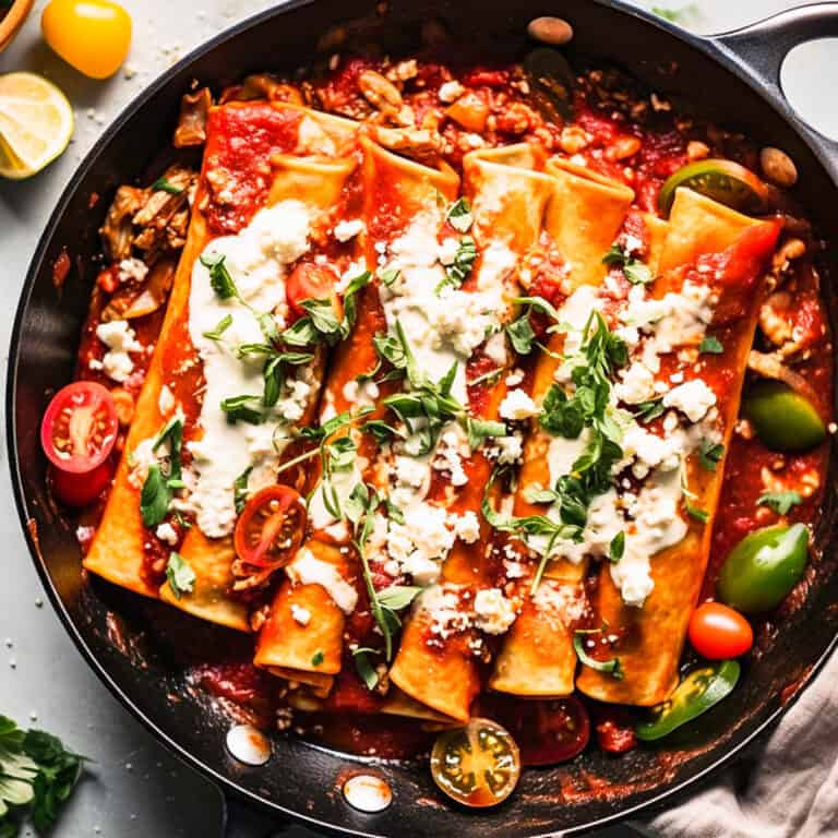 Easy vegetarian enchilada recipes with cheese in a skillet.