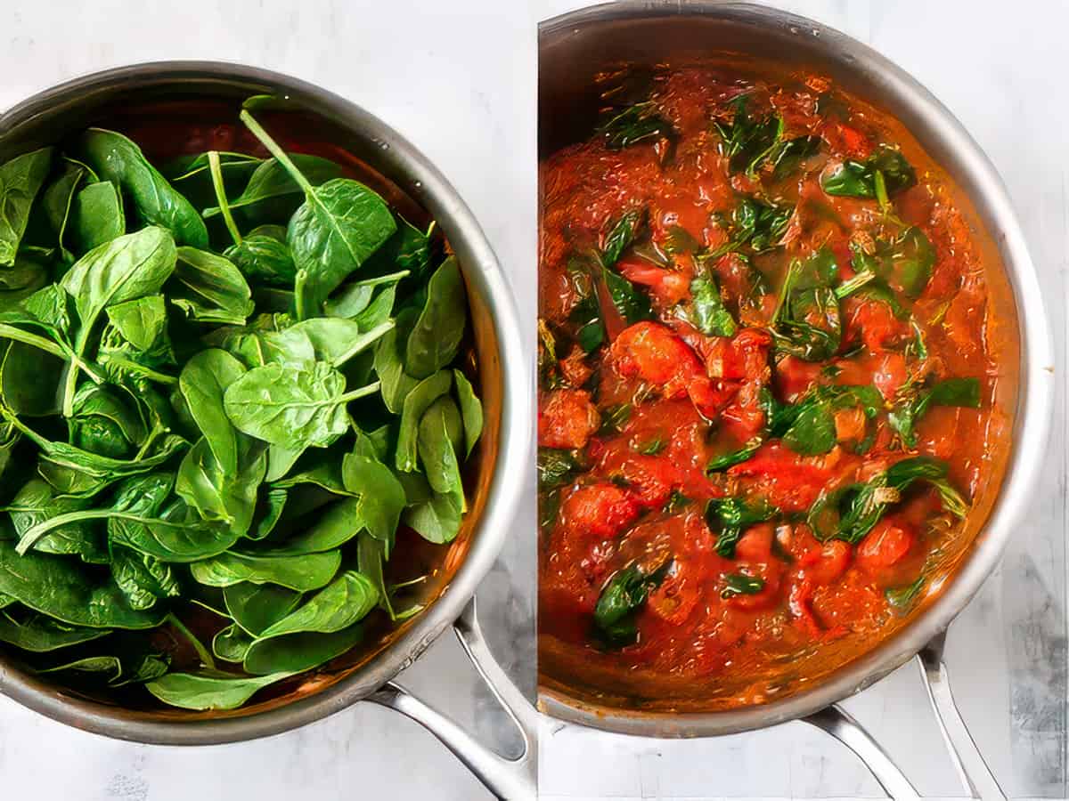 Spinach being wilted in the tomato sauce in a pan.