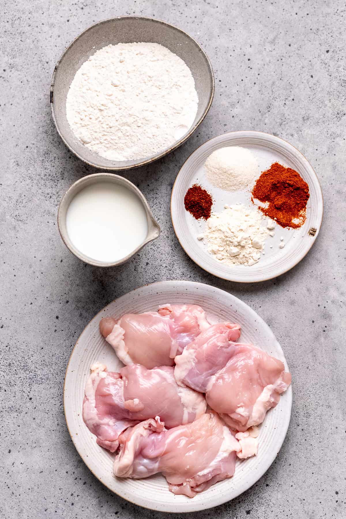 Ingredients for buttermilk chicken on a table.