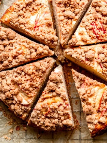 Apple crumble cake on a piece of baking paper.
